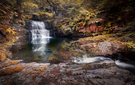 The Sychryd Cascades, a beautiful set of waterfalls in the area called waterfall country near the Dinas Rock, Pontneddfechan, South Wales, UKの写真素材