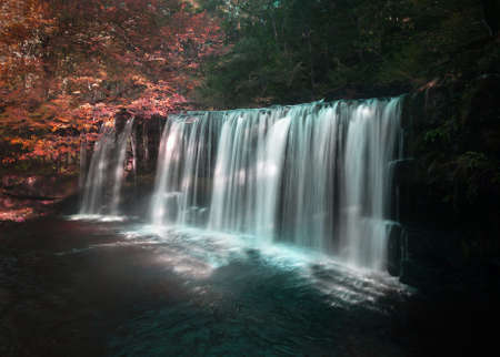 Autumn at Sgwd Ddwli Uchaf (Upper gushing falls) on the river Neath in the area known as Waterfall Country near Pontneddfechan, South Wales, UKの写真素材