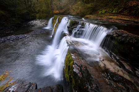 Panwar, or Sgwd y Pannwr on the lower Clun-Gwyn waterfall on the Mellte river, near Pontneddfechan in South Wales, UK.の写真素材