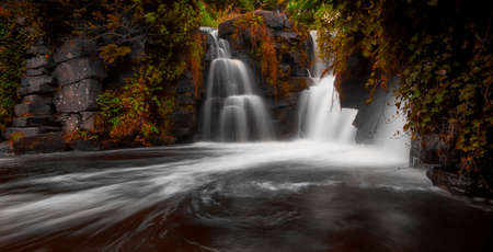 The waterfall at Penllergare Valley Woods, easily accessible just off junction 47 of the M4 motorway in Swansea, UK.の写真素材