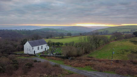 Built in 1692 this historic chapel sits on the hills overlooking the towns of Clydach and Pontadawe in South Wales UKのeditorial素材