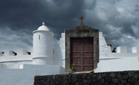 Editorial La Palma, Spain - March 28, 2022: The Castillo de la Virgen, a small 17th century fortress that looks out over the town of Santa Cruz of La Palma in the Canary Islands of Spain.のeditorial素材