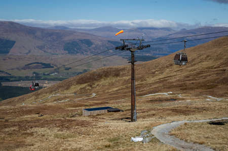 Editorial Scotland, UK - April 23, 2022: Gondolas on the Nevis Range that go up 650ft to the start of the ski resort in Fort William, Scotland UKのeditorial素材