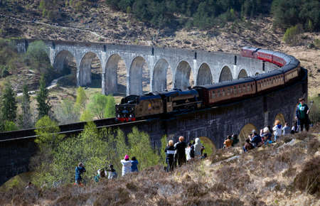 Editorial Scotland, UK - April 22, 2022: The Glenfinnan Viaduct on the West Highland line, now a huge tourist attraction due to being featured in a series of popular films.のeditorial素材