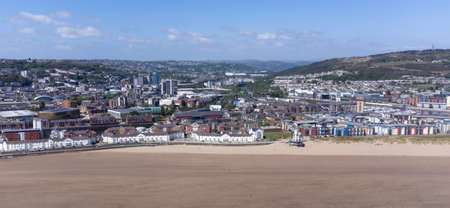 Editorial Swansea, UK - May 14, 2022:  Drone view of the centre of Swansea City, Wales UK from Swansea Bay. Flyers ID and Operators ID available upon request. CAA rules adhered to, flying height 120m or less and no closer than 50m to people and buildings.のeditorial素材
