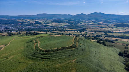Pen-y-crug, an impressive Iron Age hillfort overlooking the town of Brecon providing commanding views over the surrounding countryside.の写真素材