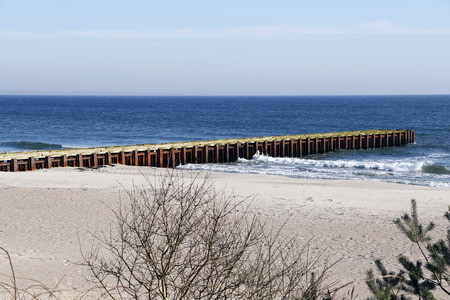 Bridge into the Baltic at a beach near the city of Ystad, Sweden.の写真素材