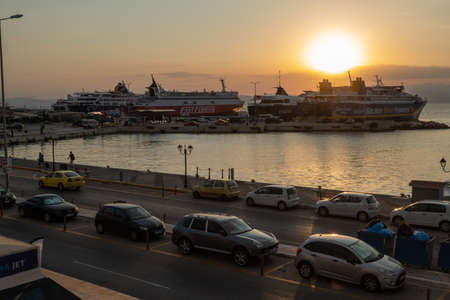 Early morning at the port of Rafina, Greece. Ferries are loaded with passengers and vehicles.のeditorial素材