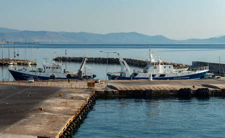 Fishing boats by quay at the port of Rafina, Greece.のeditorial素材