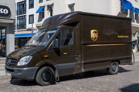 Service vehicles from UPS Worldwide Services, on a mission in Lund, Skane, Sweden.