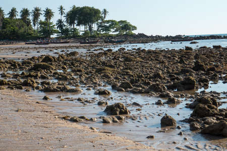 Beach at low tide, on the island of Koh Lanta in southern Thailand.の写真素材