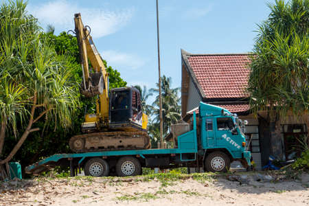Excavator transport in conjunction with a construction work on the island of Koh Lanta in southern...