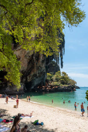 Bathing tourists at Ao Phra Nang Beach, near Ao Nang in southern Thailand.のeditorial素材