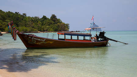 Longtail boat by the beach on the small island Koh Kradan in southern Thailand.のeditorial素材