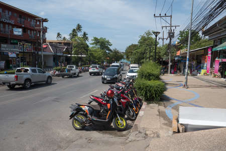 Street life with traffic in Ao Nang city in southern Thailand.のeditorial素材