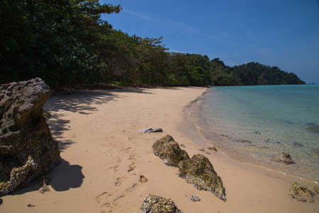 Sandy beach by the Andaman Sea, on the small island of Koh Kradan in southern Thailand.の写真素材