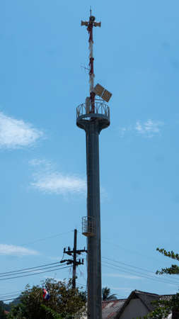 Mast with tsunami warning speakers and siren, on the west side of Koh Lanta island in southern Thailand.のeditorial素材