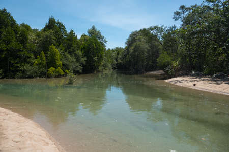 Beach at a small estuary on the west of Koh Lanta island in southern Thailand.の写真素材