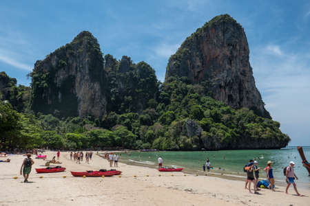 Boats and people at Railay Beach between Ao Nang and Krabi, in southern Thailand.のeditorial素材