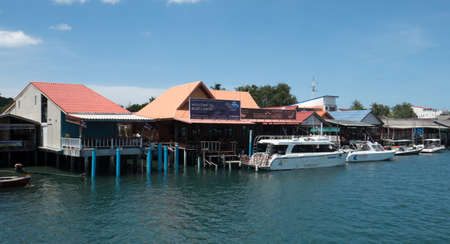 Boats and houses at the port of Saladan on the northern part of Koh Lanta island in southern Thailand.のeditorial素材