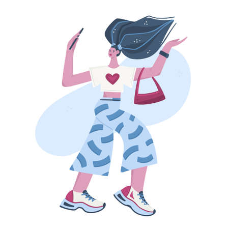 The blogger girl walks and communicates with her subscribers on her smartphone or takes a selfie....