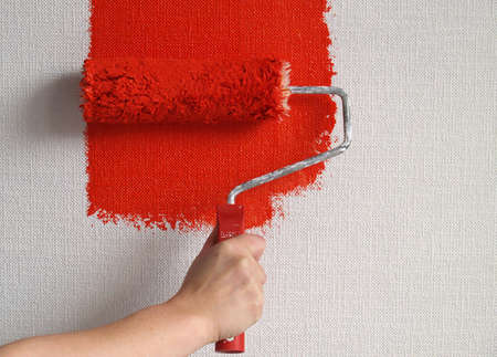 painting wall in red        の写真素材