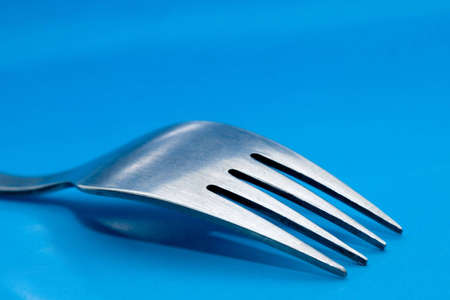 fork on blue background