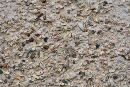 Decorative stones and cement wall detail.