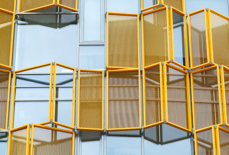 Modern style facade with yellow steel elements.