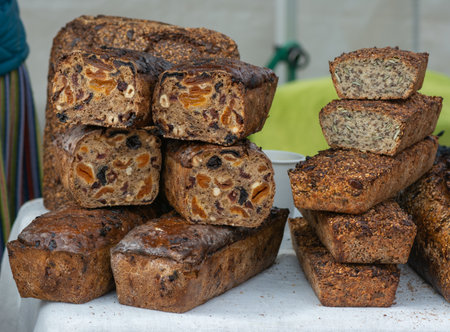 fresh bread with nuts and seeds at the farmers market.の写真素材