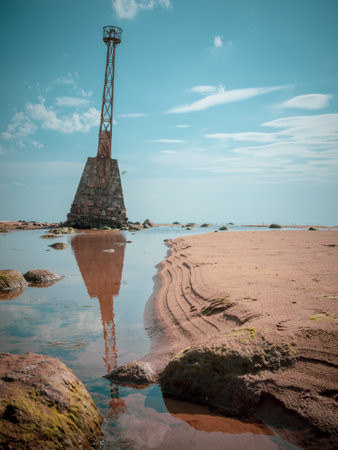 Old ruins of Kurmrags Lighthouse on the shore of the Rigas Gulf, Baltic sea, Latvia.の写真素材
