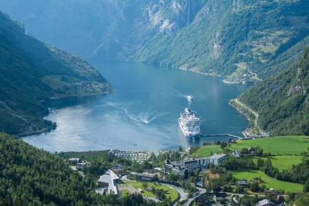 Mountain Landscape with Aerial View of Geiranger Fjord in Summer. This photo was taken from Flydalsjuvet lookout point in Geiranger.の写真素材