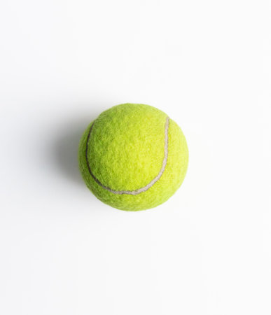 A tennis ball isolated on white background, after some edits.の写真素材