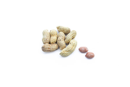 Peanuts isolated on white background. After some edits.の写真素材