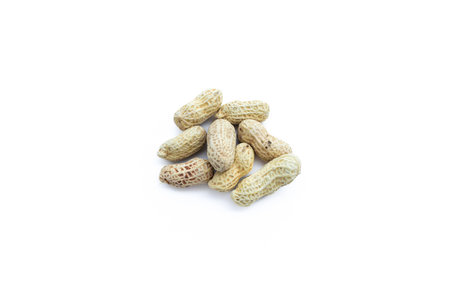Peanuts isolated on white background. After some edits.の写真素材