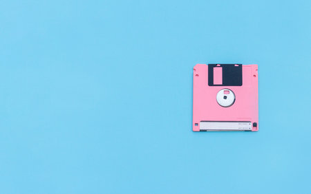 A floppy disk isolated on blue background. After some edits.の写真素材