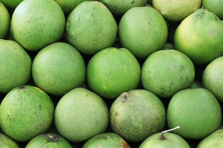 Pile of pomelo on market tray