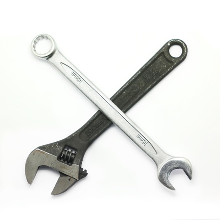 Adjustable wrench and wrench isolated on white background