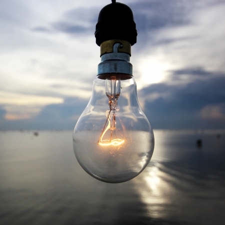 the lightbulb on beautiful sky の写真素材