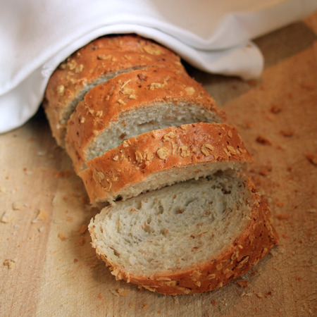 slice french baguette on buffet line