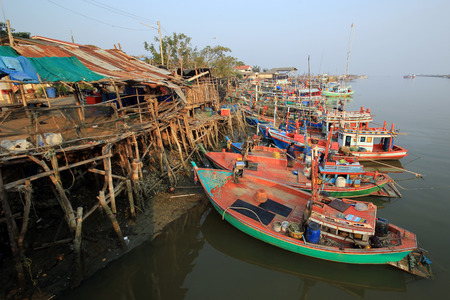colorful fishing boats at fishery villageのeditorial素材