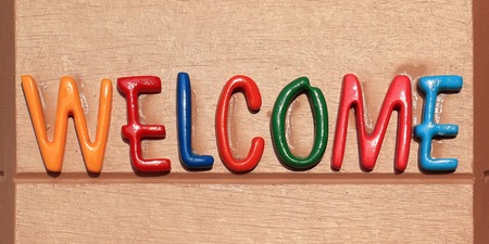 colorful of the welcome word on brown plateの写真素材