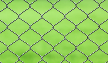 closeup of chainlink with nature backgroundの写真素材