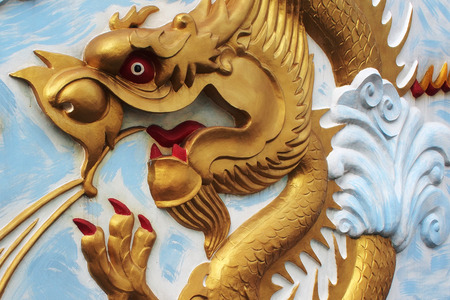 Chinese golden dragon as backgroundの写真素材