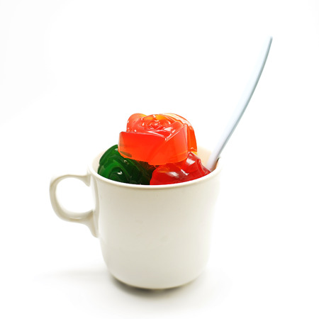 colorful gelatin or jelly dessert isolated on white backgroundの写真素材