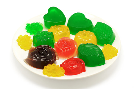 colorful gelatin or jelly dessert isolated on white backgroundの写真素材