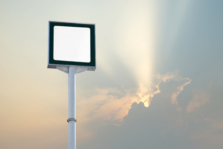blank billboard for advertisement with beautiful sunbeam backgroundの写真素材