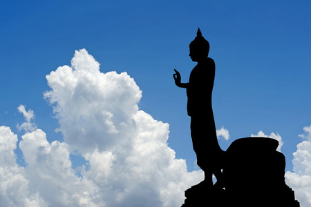 silhouette of  buddha image with beautiful sky backgroundの写真素材
