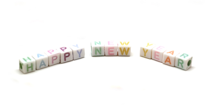 colorful word happy new year isolated on white backgroundの写真素材