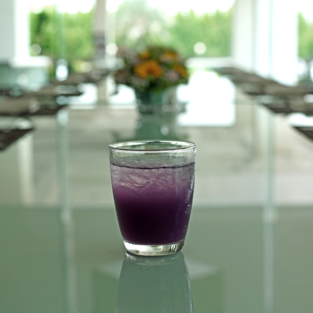 butterfly pea juice with ice and sparkling waterの写真素材